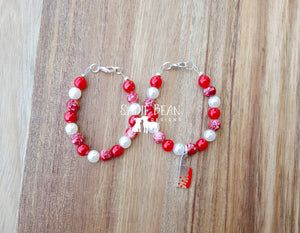 Blood splatter bracelet with axe charm